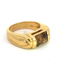 Load image into Gallery viewer, A vintage luxury piece, the Late Century 18ktyg 3ct Cognac Zircon ring features a rectangular Cognac Zircon gemstone set at its center. Crafted in 18kt yellow gold, the band showcases a polished finish with subtle detailing on either side of the gemstone. Inside, &quot;18K&quot; is engraved, affirming its gold purity.