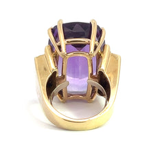 Load image into Gallery viewer, Close-up view of the Late Century 14kt yellow gold ring with a stunning 33-carat amethyst centerpiece, featuring an intricate prong setting that holds the stone securely and creates an elegant overall design. The image is taken from the back of the ring, showcasing the detailed mounting craftsmanship.