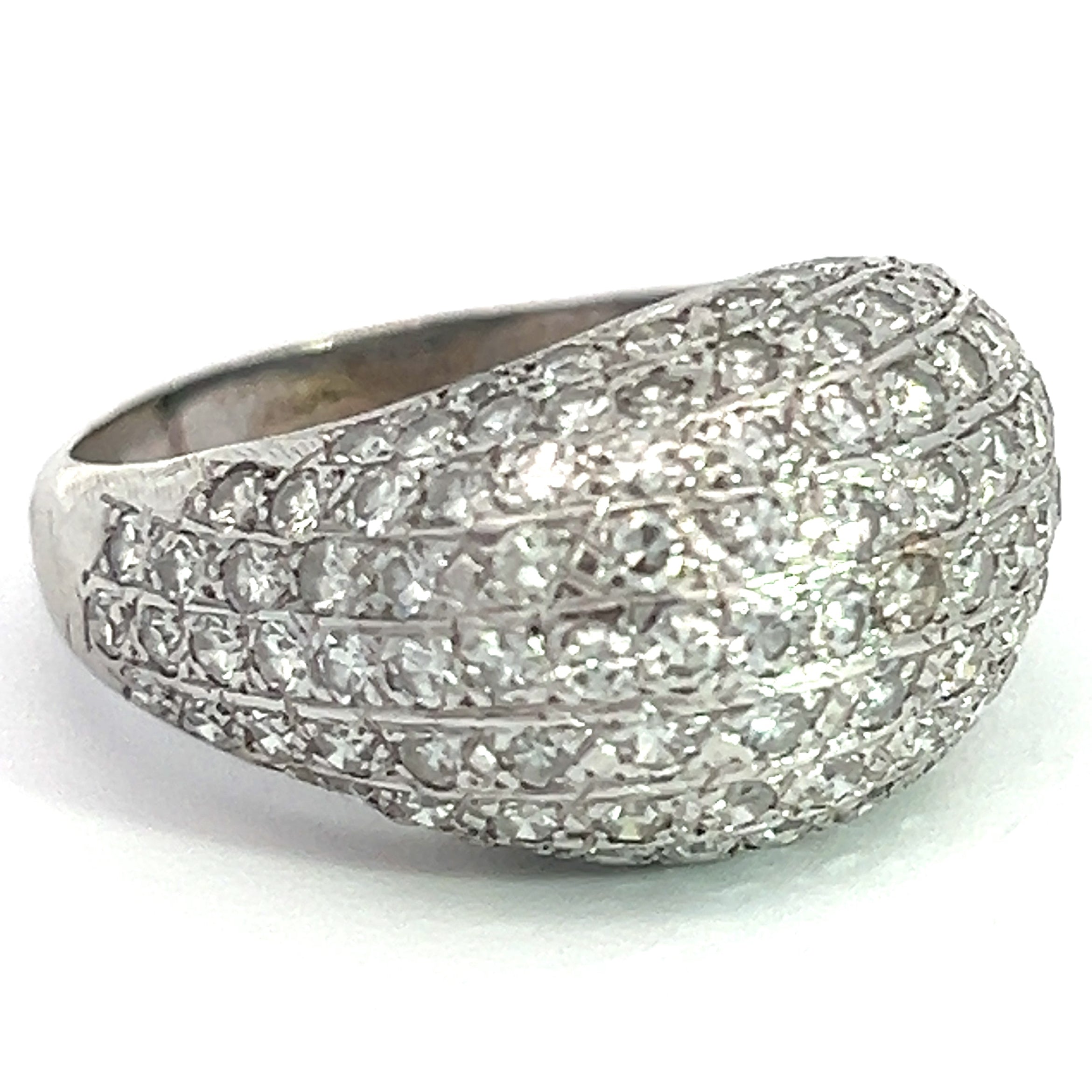The Late Century 14kt White Gold 2.70cttw Round Brilliant Cut Pave Diamond Ring features a dome-shaped design encrusted with multiple rows of round brilliant cut diamonds, creating a textured and luxurious appearance. The ring is elegantly showcased against a plain white background, highlighting its intricate design and shimmering stones.