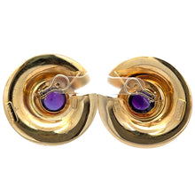 Load image into Gallery viewer, These distinctive Late Century Peter Wong 10ct Cabochon Amethyst Earrings feature a vintage gold-tone clip-on style with a circular design. Showcasing artistic craftsmanship, they boast a curved shape and a central purple gemstone, exuding the elegance of late-century design.