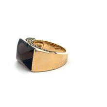 Load image into Gallery viewer, The Late Century 18kt Yellow Gold Smokey Topaz + 2cttw Yellow Sapphires ring, designed by Agori, showcases a large, dark smokey topaz set in the center. The design features smooth, clean lines, giving it a modern and elegant appearance against a plain white background.