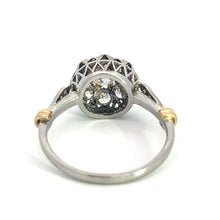 Load image into Gallery viewer, Displayed is a stunning Edwardian Platinum &amp; 18kt Yellow Gold 1.30cttw Old Mine Cut Diamond Ring. It features a round central diamond surrounded by Old Mine cut diamonds, with gold accents on the band near the setting. Positioned upwards, it highlights the detailed craftsmanship and intricate design.