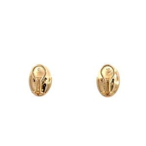 A pair of small, oval-shaped gold earrings with smooth surfaces is displayed against a white background. Reminiscent of Art Deco 14kt Yellow & White Gold Mother of Pearl Omega Back Earrings, the back reveals the clip mechanism for securing them to the ear.