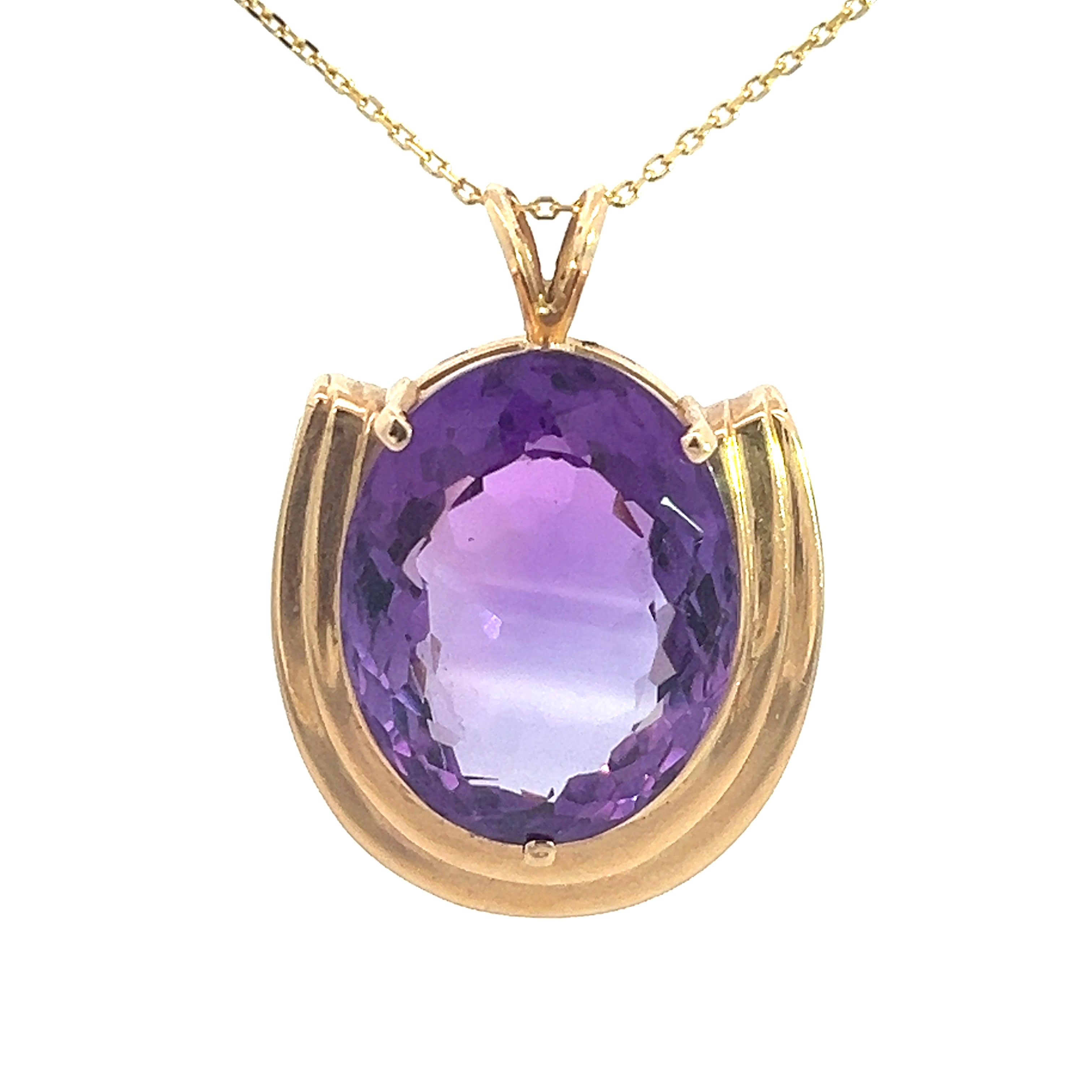 The Late Century 14ktyg 25kct Oval Cut Amethyst Necklace features a vibrant, oval-cut purple amethyst set within a gracefully curved gold frame. This sophisticated and elegant pendant is beautifully complemented by a thin and delicate chain.