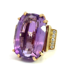 Load image into Gallery viewer, Introducing the Late Century 14ktyg 33ct Amethyst + .70cttw Diamond Ring: This stunning piece showcases a large, rectangular-cut amethyst held securely by multiple prongs. The 14kt yellow gold band is elegantly accented with several small diamonds on each side of the striking purple stone, adding extra sparkle to this exquisite ring.