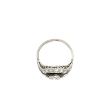 Load image into Gallery viewer, An exquisite Late Art Deco ring featuring a .90ct round brilliant-cut diamond at its center, surrounded by an array of smaller diamonds totaling 1.96 carats in a stunning cluster design. The clean and simple band accentuates the ornate setting, while subtle black enamel adds an extra touch of vintage luxury to this elegant piece.