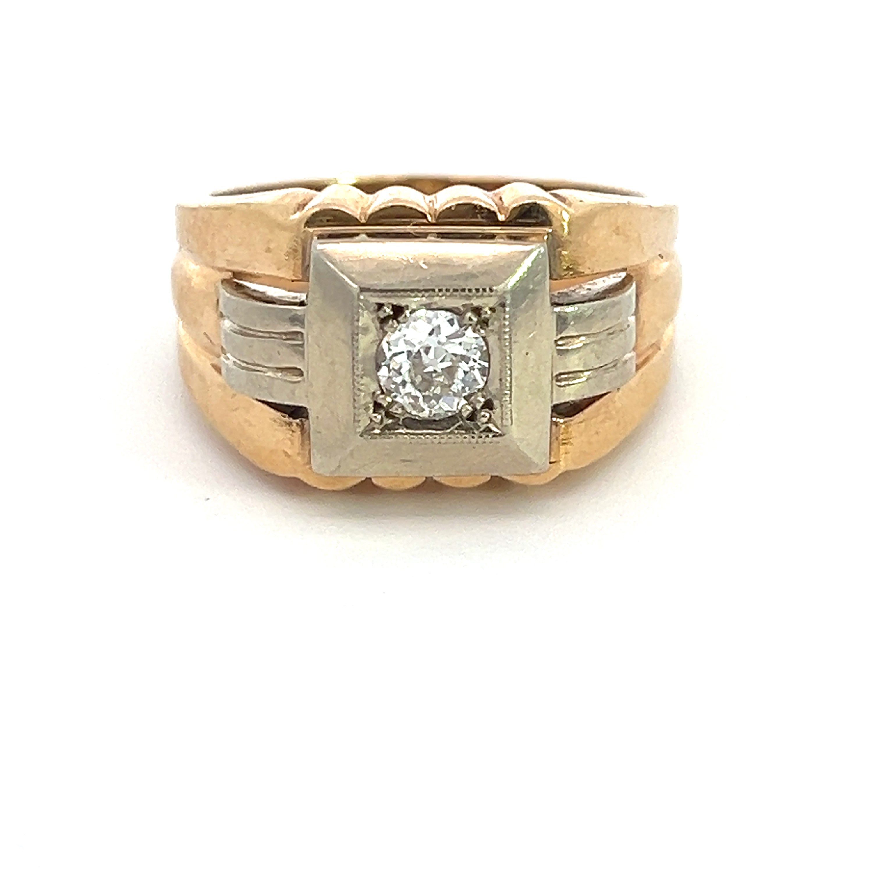 The Art Deco 14kt Two Tone Gold .40ct Old European Cut Diamond Ring showcases a square setting with a prominent old European cut diamond at its center. The ring features a slightly wide band adorned with ridged details on the sides, blending gold and silvery elements around the setting to create an elegant and classic appearance.