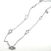 Load image into Gallery viewer, A delicate platinum necklace featuring a fine chain interspersed with approximately 5 carats of multi-shaped aquamarines, including round, oval, and teardrop. The Mid Century Platinum Approx 5ct Multi Shape Aquamarine by the Yard 20 Inch Necklace is neatly arranged on a plain white background, exuding mid-century craftsmanship.