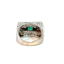 Load image into Gallery viewer, Presenting the exquisite Late Century 14kt White Gold ring, adorned with a central 1ct emerald-cut emerald and encrusted with 5.70cttw of round brilliant cut diamonds on its square-shaped top. The intricate setting and inner band are beautifully highlighted against a pristine white background.