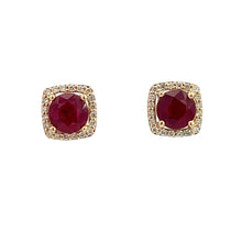 Load image into Gallery viewer, A pair of Modern 14ktyg earrings featuring 2.43ct vivid red rubies surrounded by .25cttw small, sparkling diamonds. The luxury jewelry has a cushion-cut halo setting, giving the Ruby and Diamond Stud Earrings a classic and elegant appearance.