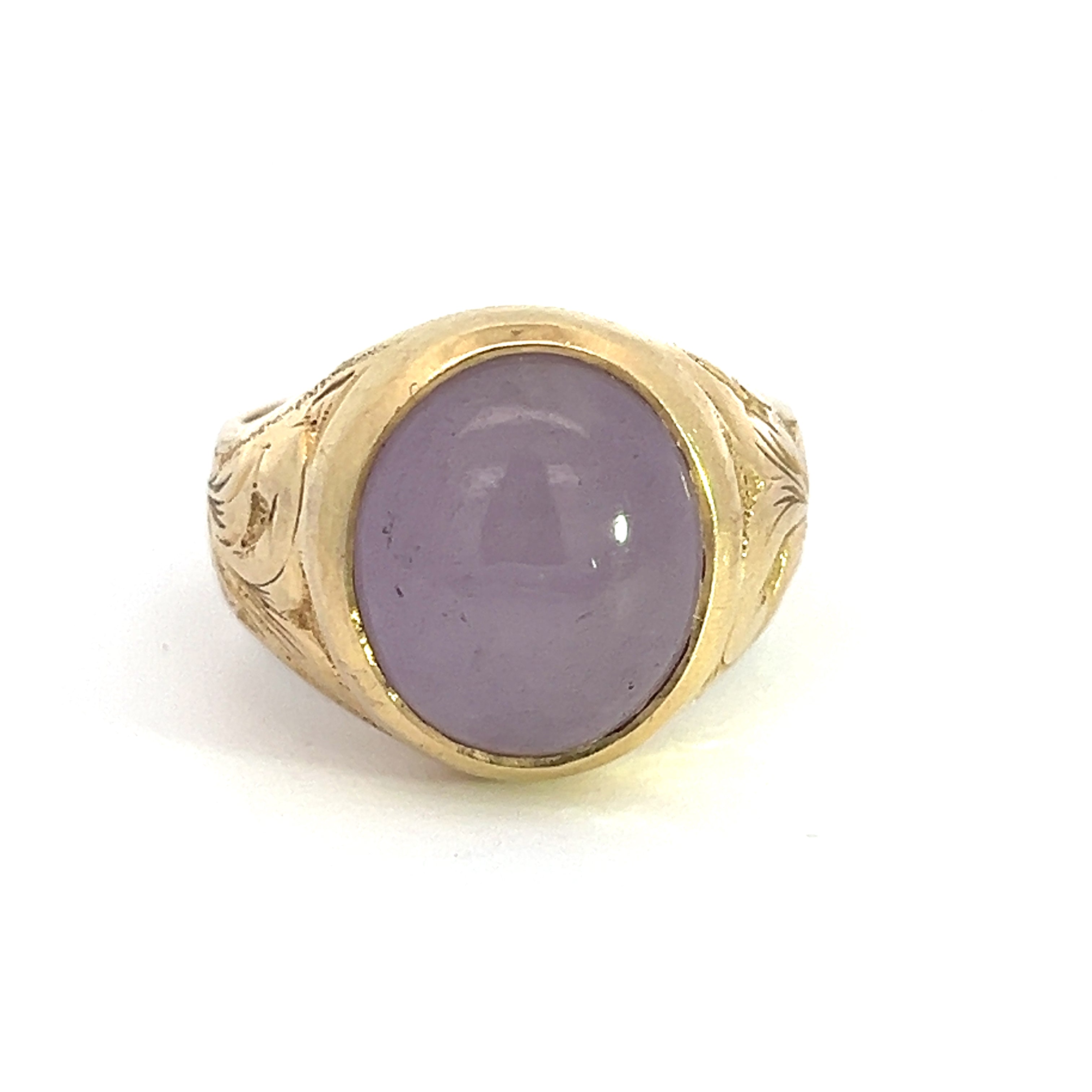 A Late 14kt yellow gold ring with detailed engravings on the band, featuring an approximately 8-carat polished lavender jade gemstone set in the center.