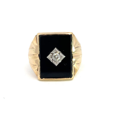 The Art Deco 10kt Yellow Gold .10ct Round Diamond Onyx Ring exudes vintage elegance with its rectangular black onyx centerpiece. Adorned with a small round diamond in a square setting, the band features subtle engravings on the sides, perfectly blending classic Art Deco elements.