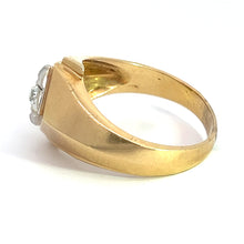 Load image into Gallery viewer, A vintage Late Century 14kt Two Tone Gold .25ct Old Mine Cut Diamond ring with a thick band and a slightly raised setting displays a small, round diamond. The smooth, shiny two-tone gold ring is positioned on its side with the diamond facing left, highlighting its design and craftsmanship.