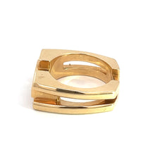 Load image into Gallery viewer, The Late Century 14ktyg Gauthier .35cttw Heavy Gold Ring, crafted from 14kt yellow gold, showcases a distinctive rectangular design with two open sections on either side for a modern geometric appeal. The ring is adorned with diamonds and set against a plain white background.