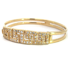 Load image into Gallery viewer, Introducing the Late Century 18ktyg 1.80cttw Greek Key Diamond Bangle Bracelet: a stunning gold bracelet featuring a geometric pattern of sparkling diamonds. This exquisite piece boasts a double band design, with the diamond-encrusted section on the front forming an elegant zigzag motif inspired by the traditional Greek key pattern. Presenting this breathtaking bracelet on a pristine white background enhances its captivating allure.
