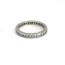 Load image into Gallery viewer, Introducing the Art Deco Platinum 1cttw Round Brilliant Cut Diamond Band, a stunning wedding ring that showcases intricate detailing and small round brilliant cut diamonds encircling its entire circumference. The ring is elegantly photographed against a plain white background.