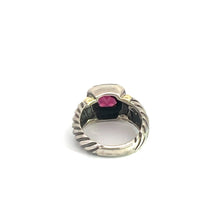 Load image into Gallery viewer, A detailed view of the Late Century 14ktyg/silver David Yermen Ring, showcasing a twisted rope design in sterling silver and a striking rectangular 2.50ct garnet gemstone. The ring features an elevated setting that elegantly positions the gemstone above the band, all set against a plain white background.