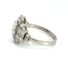 Load image into Gallery viewer, The Art Deco Platinum .91ct Old European Cut Diamond + 1.60cttw Diamond Ring showcases a striking multi-stone diamond cluster design atop a sleek, simple band that enhances the detailed diamond arrangement. Echoing the elegance of Art Deco jewelry, this exquisite piece is presented against a white background.