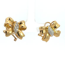 Load image into Gallery viewer, A pair of stunning Mid Century 18kt Yellow Gold .50cttw Bow Earrings with a central section adorned with dazzling diamonds. The earrings have a glossy finish, reflecting light and adding a touch of sparkle. They exude vintage charm and are displayed against a simple white backdrop.