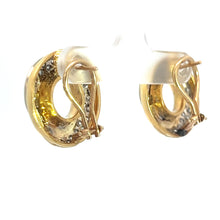 Load image into Gallery viewer, A close-up image of a pair of gold hoop earrings. The earrings, crafted from 18kt yellow gold, are adorned with small sparkling stones and have a shiny, polished finish. These Late Century 18kt Yellow Gold 2.25cttw Round Brilliant Cut Diamond Swirl Earrings are displayed against a white background with plastic earring backings attached.