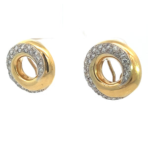 A pair of Late Century 18kt Yellow Gold 2.25cttw Round Brilliant Cut Diamond Swirl Earrings with a circular design. These earrings feature an open center and are adorned with small, sparkling diamonds around the outer edge, exuding vintage glamour with their spiral-inspired design.