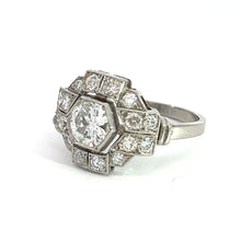 Load image into Gallery viewer, The Art Deco Platinum .91ct Old European Cut Diamond + 1.60cttw Diamond Ring boasts an elegant central old European cut diamond, surrounded by a sophisticated octagonal arrangement of smaller diamonds. Its intricate geometric design gives it a vintage, Art Deco jewelry charm against a white background.