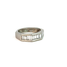 Load image into Gallery viewer, A silver ring showcasing classic elegance with a row of rectangular, vertically aligned emerald-cut diamonds set into the band. The setting is simple and refined, reminiscent of a Late Century Platinum Henri Carre 1.50cttw Emerald Cut Diamond Band. Photographed against a plain white background, it has a subtly striking accent.