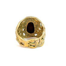 Load image into Gallery viewer, The Late Century 14ktyg Freeform 5ct Fire Agate Ring features a 14kt yellow gold band with an intricate, abstract design. Its centerpiece is a dark Fire Agate gemstone, and the band showcases uneven, organic patterns and hole-like cutouts that provide a unique, handcrafted appearance with vintage charm.