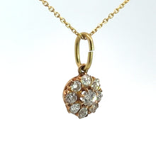 Load image into Gallery viewer, The Victorian 14ktyg 1.16cttw Old Mine Cut Diamond Pendant showcases a cluster of small, round, sparkling Old Mine Cut diamonds set in a circular design. This exquisite gold pendant necklace features a delicate 14kt yellow gold chain with a simple loop attachment, all beautifully presented against a plain white background.
