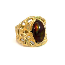 Load image into Gallery viewer, The Late Century 14ktyg Freeform 5ct Fire Agate Ring features an intricate, lace-like design crafted in 14kt yellow gold and boasts a large, oval-shaped fire agate gemstone at its center, which showcases iridescent hues of green and orange against a white background, exuding vintage charm.