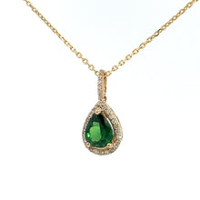 Load image into Gallery viewer, A Modern 14ktyg necklace featuring a 1.38ct pear-shaped, deep green Tsavorite Garnet pendant, elegantly surrounded by .25cttw of small diamonds and attached to a delicate gold chain.