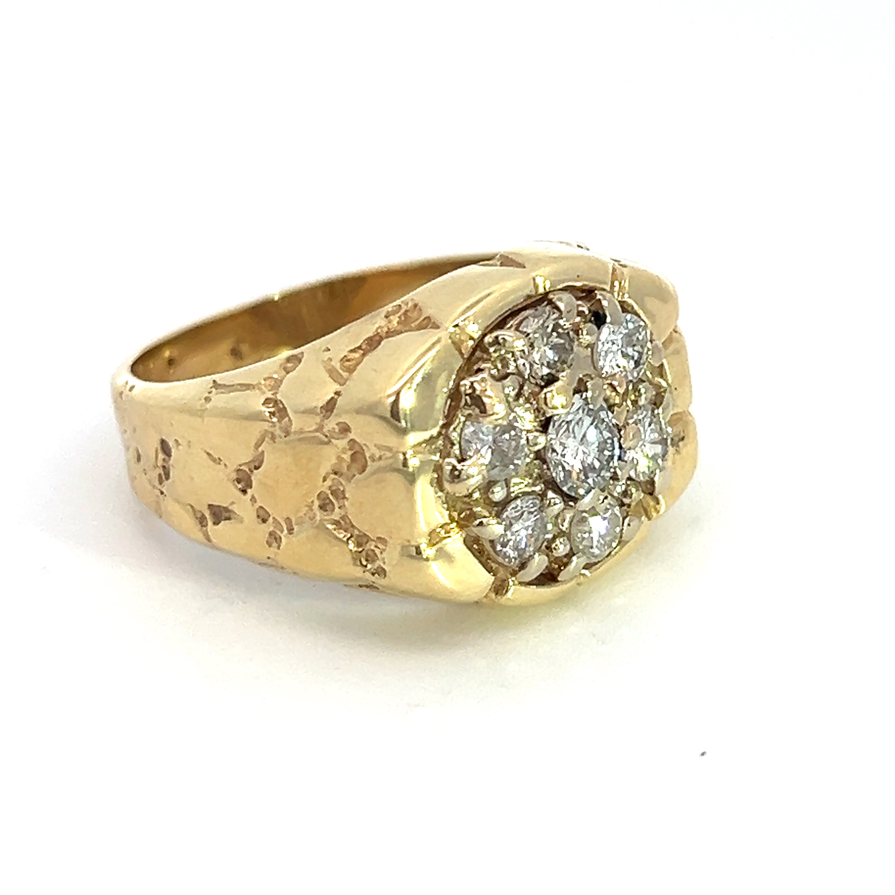 The Late Century 14ktyg 1ct Round Brilliant Cut Diamond Cluster Nugget Ring in yellow gold showcases a stunning floral design with a central diamond cluster. The intricately detailed band enhances its elegant and luxurious vintage appeal.