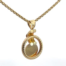 Load image into Gallery viewer, The Victorian 14kt yellow gold pendant, featuring a .50ct cabochon garnet and diamond-cut details, is elegantly suspended on an 18-inch chain. Its contemporary yet classic design boasts both polished and textured surfaces, echoing a hint of Victorian allure that makes the pendant the center of attention against any background.