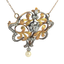 Load image into Gallery viewer, Presenting the Edwardian Platinum &amp; 18kt Yellow Gold Necklace, this exquisite piece showcases a finely detailed design with elegant gold swirls and sparkling silver accents. The necklace is adorned with glistening old mine and rose cut diamonds totaling 4.35 carats, while a single pearl elegantly dangles from the bottom. Attached to a delicate chain, this necklace exudes timeless Edwardian sophistication.
