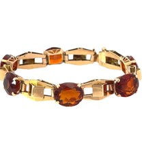 Load image into Gallery viewer, The Retro 14kt Yellow Gold 30cttw Madeira Citrine 7in Bracelet showcases a series of alternating links featuring rectangular gold pieces and oval, deep orange Madeira Citrine gemstones. The bracelet exudes retro charm with its geometric, elegant design, highlighting gemstones mounted in gold settings.