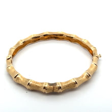 Load image into Gallery viewer, Introducing the Late Century 14ktyg Bamboo Style Bangle Bracelet, a luxurious piece of jewelry crafted from 14kt yellow gold to resemble bamboo. This exquisite bangle features a textured finish with segmented patterns that mimic bamboo stalks and includes a clasp for effortless opening and closing.