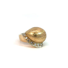 Load image into Gallery viewer, The Late Century 14kt Yellow Gold .50cttw Diamond Ring with Satin Finish features a large textured dome-shaped central design adorned with a row of small sparkling diamonds at its base, exuding vintage charm. The ring is set against a plain white background.