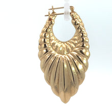 Load image into Gallery viewer, A close-up image of a single Late Century 14kt Yellow Gold Textured Drop Earring, showcasing its textured, ribbed, and layered teardrop design. The earring features a secure latch-back closure. The plain white background accentuates the detailed craftsmanship and shiny finish, radiating vintage charm.