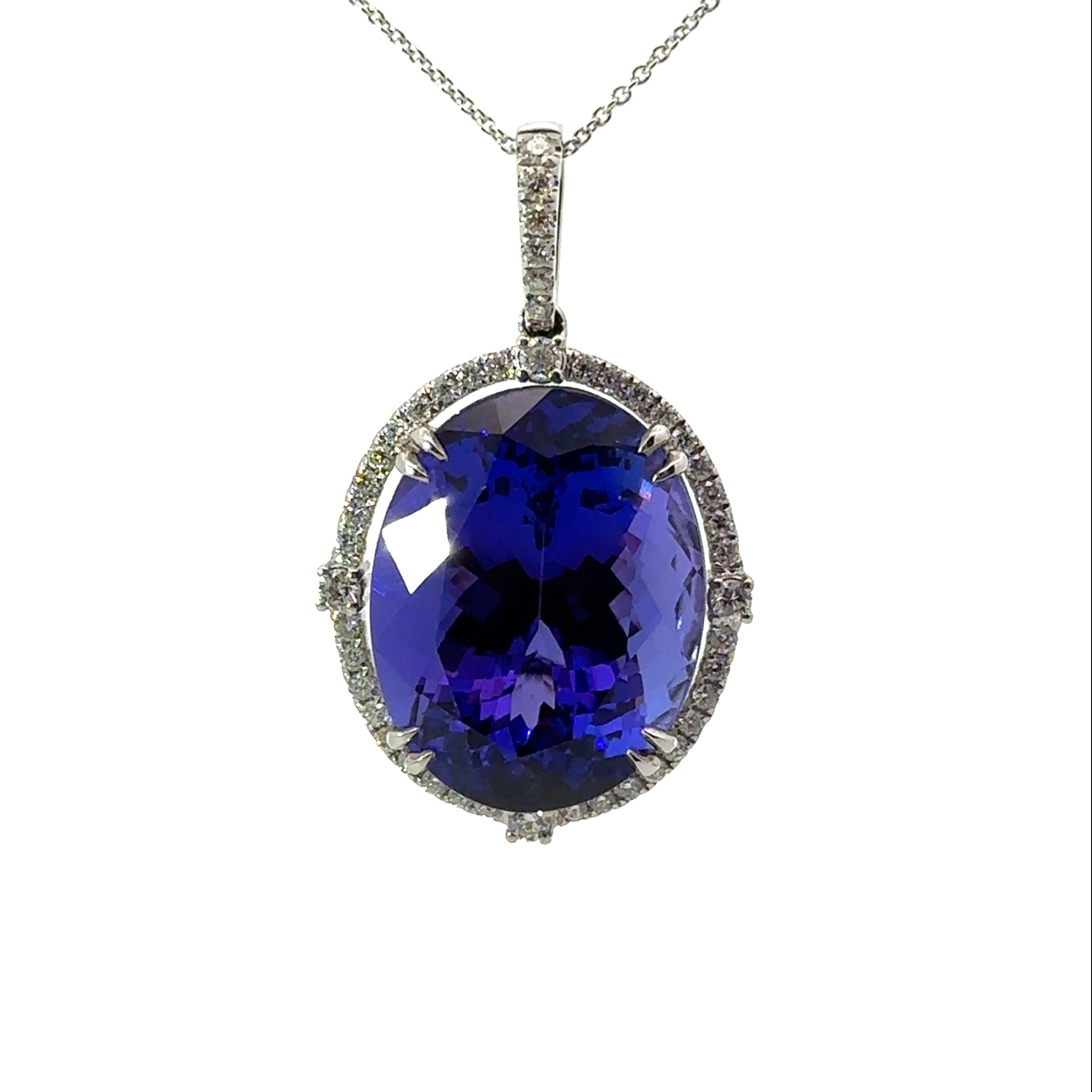 Modern 18kt White Gold Oval Gem Quality Tanzanite + Diamond Pendant
