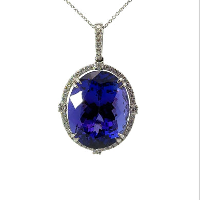 Modern 18kt White Gold Oval Gem Quality Tanzanite + Diamond Pendant