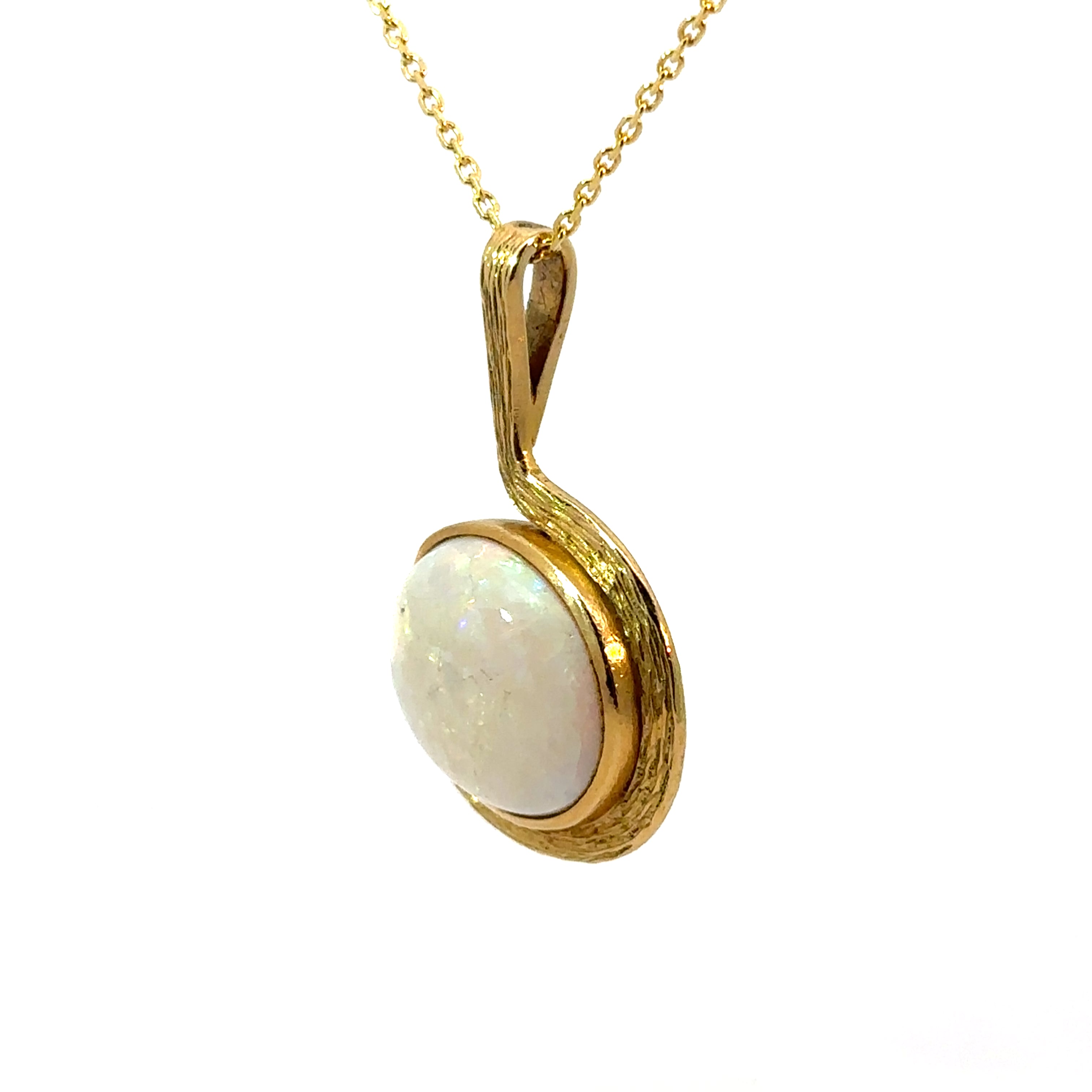 Late Century 18kt Yellow Gold, Opal on textured Gold Frame